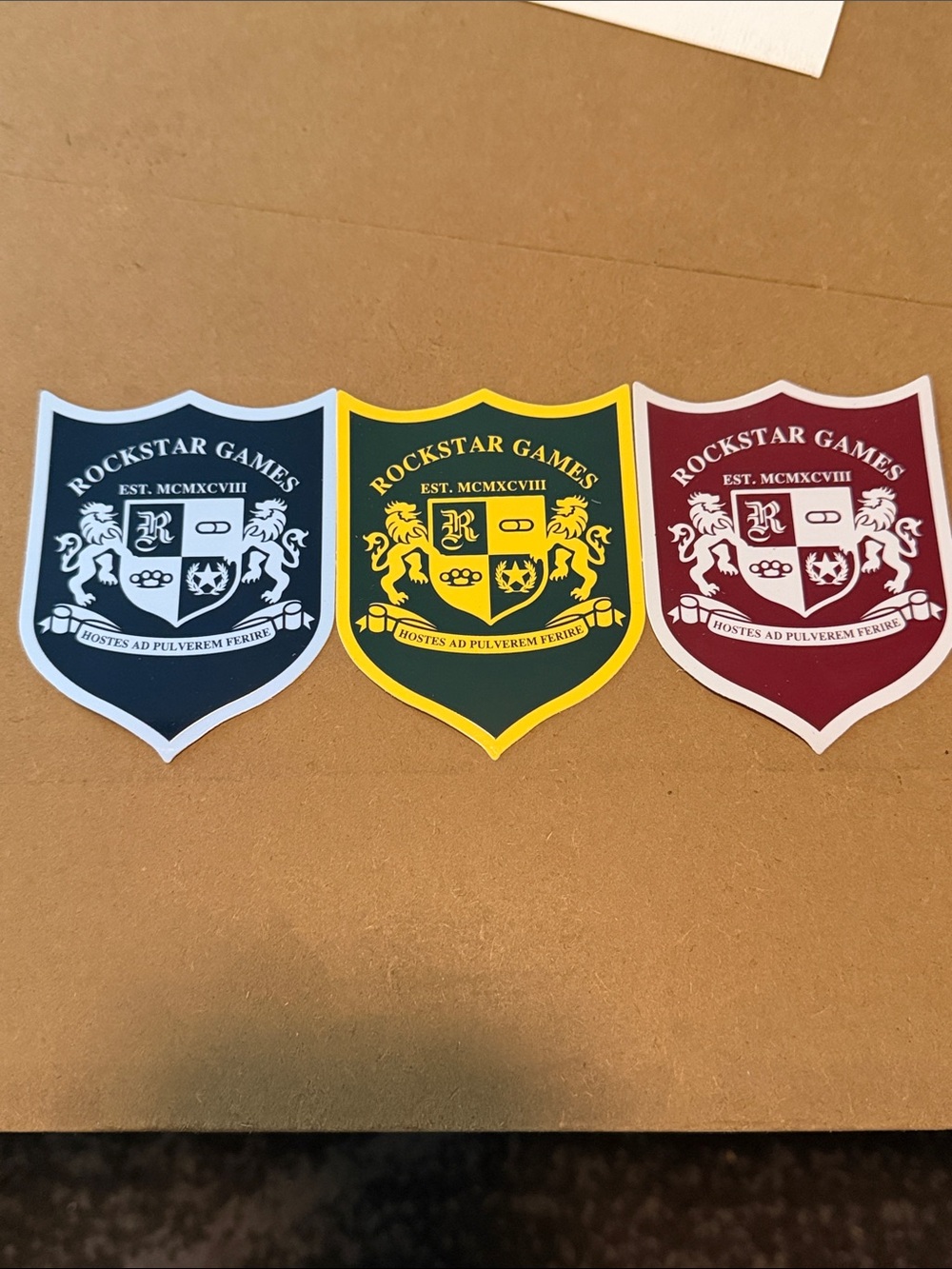 Set of 3 ROCKSTAR GAMES Shield Sticker Pack - Green, Navy, Burgundy